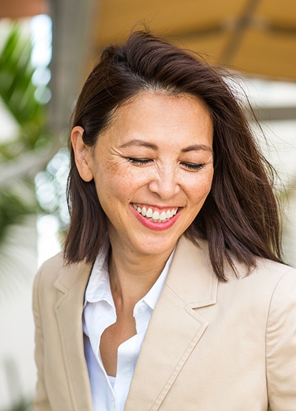 Woman with gorgeous smile after cosmetic dentistry