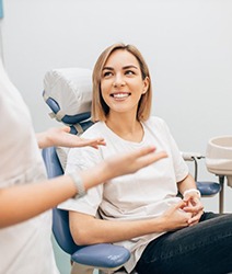 woman talking to her cosmetic dentist in Edmonton 