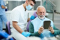 An elderly man who received dentures 