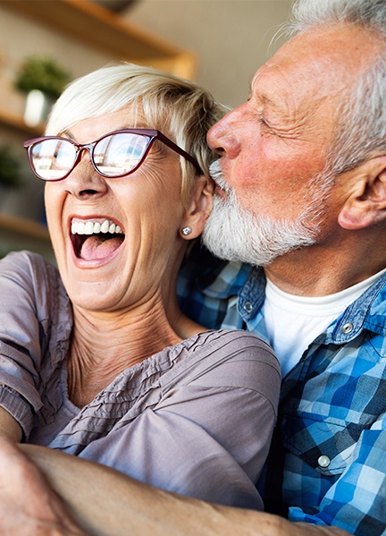 Man and woman with healthy smiles