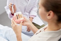 a patient at their dental implant consultation in Edmonton