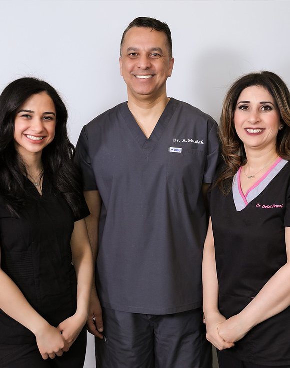 Three smiling Edmonton dentists