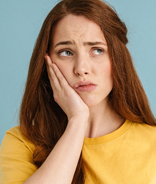 young woman with toothache