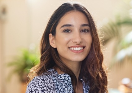 Woman with straighter smile after Invisalign clear braces treatment