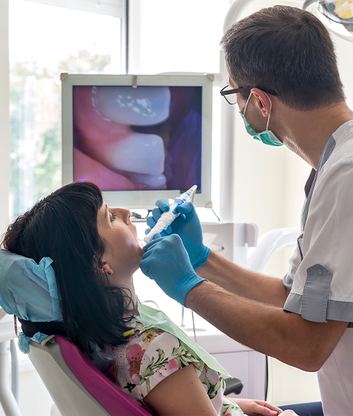 Woman receiving 3 D X-Ray scans