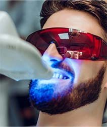 Patient getting in-office teeth whitening in Edmonton 